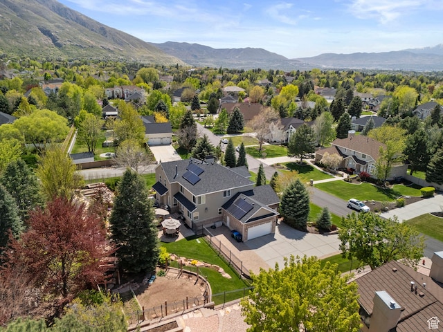 aerial perspective of suburban area featuring a mountainous background