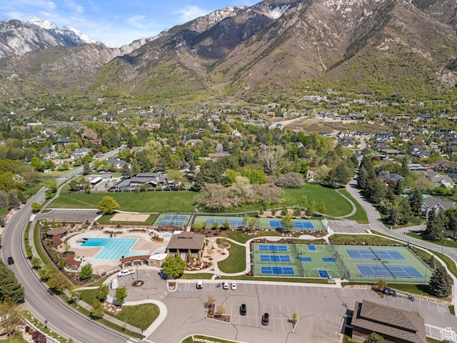 aerial view of property's location featuring mountains and a pool