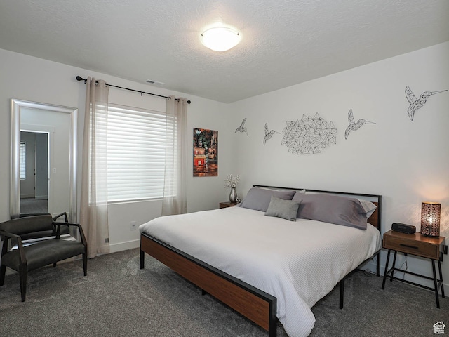 carpeted bedroom with baseboards