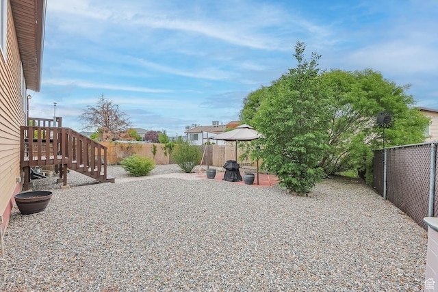 7963 S 2800 W, West Jordan, UT 84088 - fenced backyard featuring a patio and a gazebo