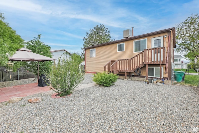 7963 S 2800 W, West Jordan, UT 84088 - rear view of property with a gazebo, fence, and a patio area