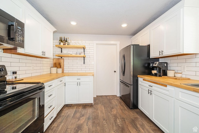 4302 W 2350 N, Plain City, UT 84404 - kitchen with butcher block counters, black appliances, open shelves, dark wood-style floors, and recessed lighting