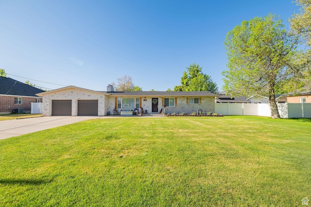 4302 W 2350 N, Plain City, UT 84404 - single story home with a garage, driveway, central AC, and brick siding