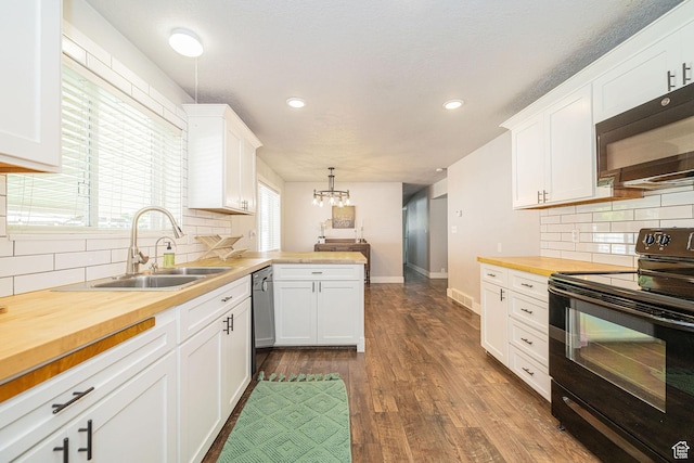 4302 W 2350 N, Plain City, UT 84404 - kitchen with black appliances, wooden counters, a sink, white cabinets, and recessed lighting