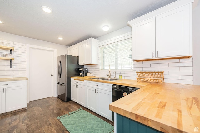 4302 W 2350 N, Plain City, UT 84404 - kitchen featuring butcher block countertops, freestanding refrigerator, a sink, dark wood-style floors, and backsplash