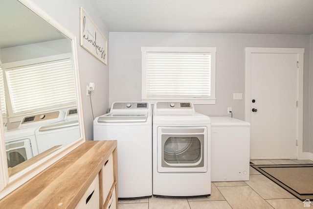 4302 W 2350 N, Plain City, UT 84404 - laundry area featuring washer and dryer and light tile patterned flooring