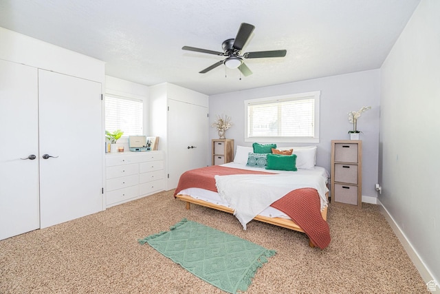 4302 W 2350 N, Plain City, UT 84404 - carpeted bedroom with multiple closets, multiple windows, and ceiling fan