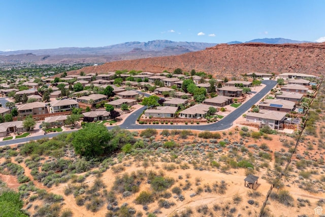 aerial perspective of suburban area with a mountainous background