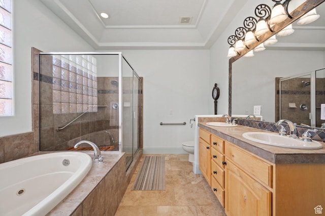 full bath featuring a shower stall, double vanity, a whirlpool tub, toilet, and a tray ceiling