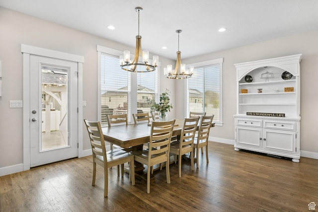 dining space with a chandelier, dark wood-style floors, baseboards, and recessed lighting