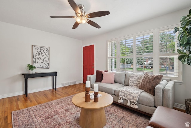2484 S 800 E, Salt Lake City, UT 84106 - living area featuring a ceiling fan, wood finished floors, and baseboards