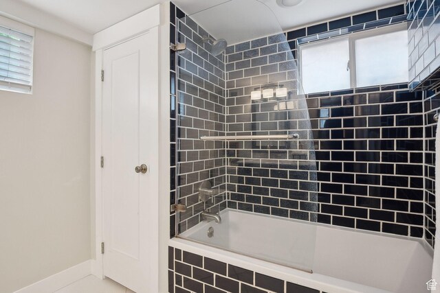 2484 S 800 E, Salt Lake City, UT 84106 - bathroom with tiled shower / bath combo and baseboards