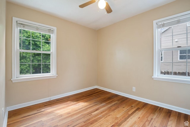 2484 S 800 E, Salt Lake City, UT 84106 - empty room featuring baseboards, light wood finished floors, and a ceiling fan