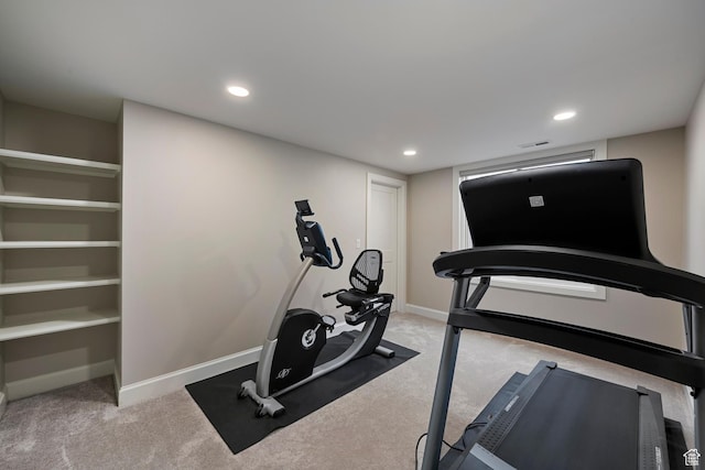 exercise area with carpet flooring, baseboards, and recessed lighting