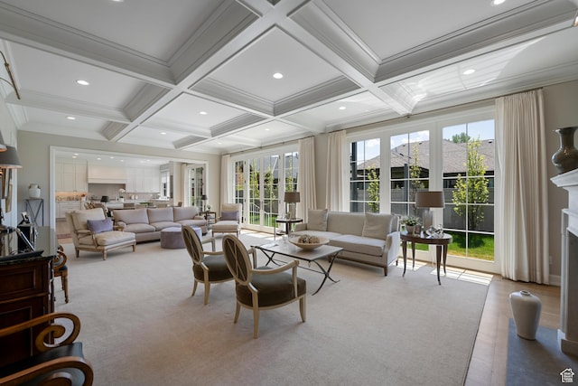 living area featuring coffered ceiling, beamed ceiling, carpet floors, recessed lighting, and crown molding