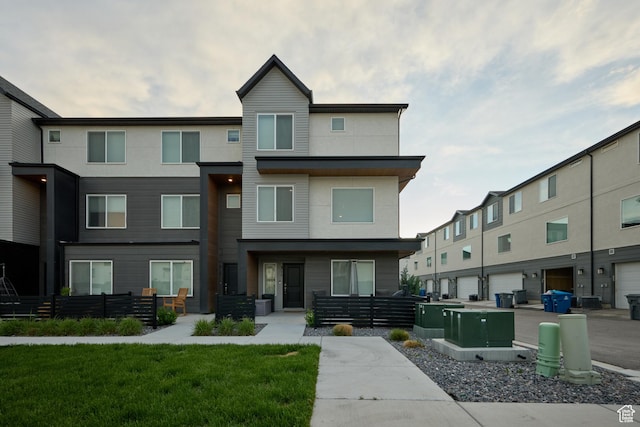311 S 1130 W Unit 24, American Fork, UT 84003 - view of front facade with fence and stucco siding