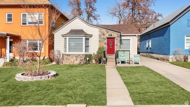821 E 100 S, Salt Lake City, UT 84102 - view of front facade with stone siding and a front yard