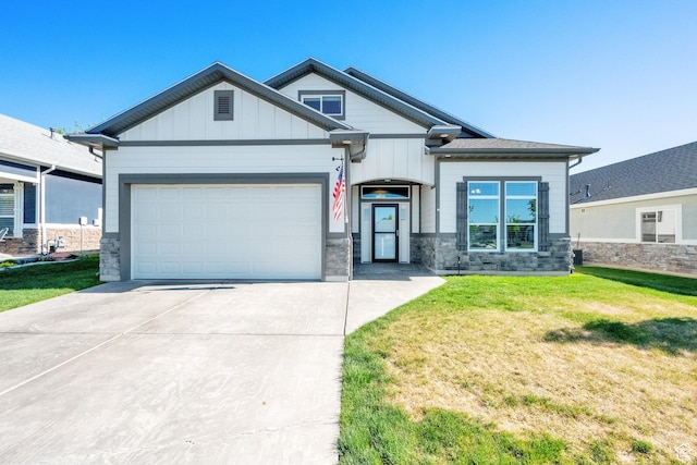 2081 W Jackson Ln, Syracuse, UT 84075 - craftsman-style house featuring stone siding, driveway, a garage, and a front lawn