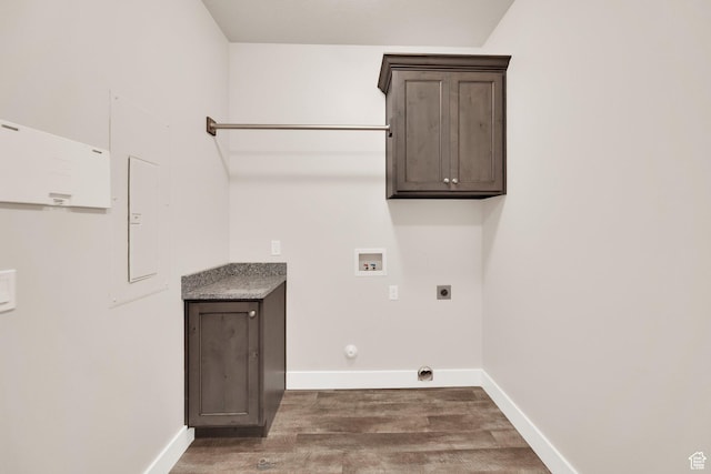 2081 W Jackson Ln, Syracuse, UT 84075 - laundry area with electric dryer hookup, wood finished floors, washer hookup, and baseboards