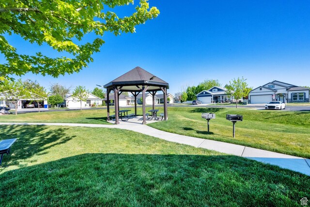 2081 W Jackson Ln, Syracuse, UT 84075 - view of green lawn with a gazebo and a residential view