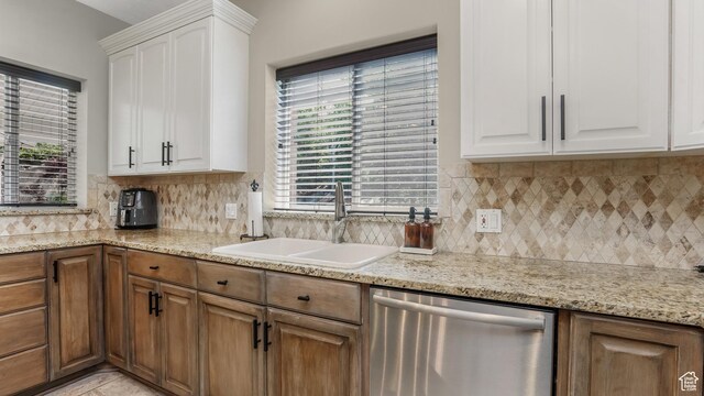 1776 E Horizon Point Cir, Draper, UT 84020 - kitchen featuring stainless steel dishwasher, a sink, backsplash, and white cabinetry