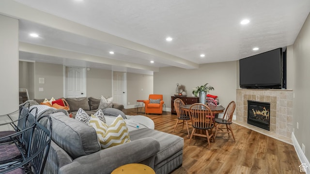 1776 E Horizon Point Cir, Draper, UT 84020 - living room with wood finished floors, recessed lighting, baseboards, and a tiled fireplace