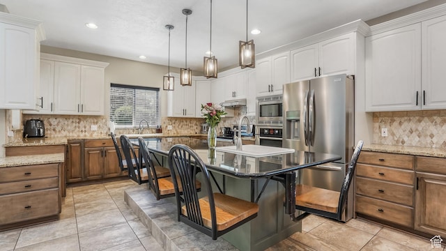 1776 E Horizon Point Cir, Draper, UT 84020 - kitchen with stainless steel appliances, white cabinetry, backsplash, light stone counters, and recessed lighting