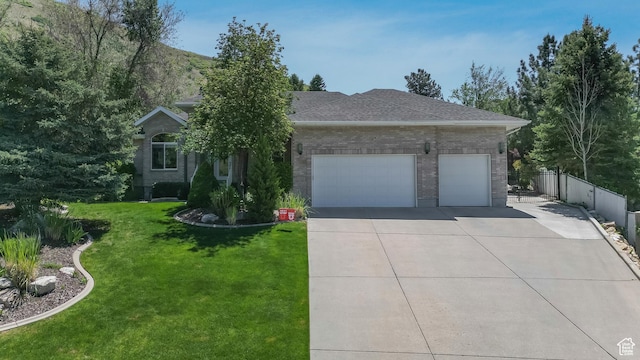 1776 E Horizon Point Cir, Draper, UT 84020 - view of front of home with concrete driveway, a garage, brick siding, and a shingled roof