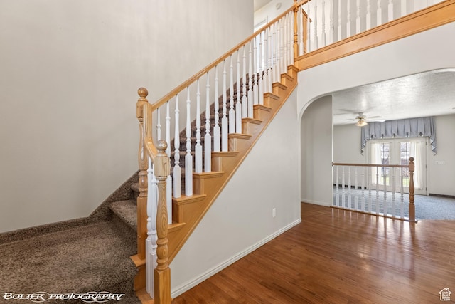 1688 N 175 W, Cedar City, UT 84721 - staircase with wood finished floors, arched walkways, baseboards, ceiling fan, and french doors