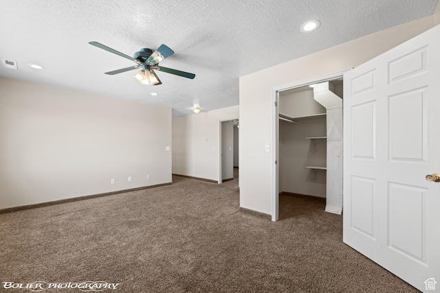 1688 N 175 W, Cedar City, UT 84721 - unfurnished bedroom with carpet floors, a spacious closet, baseboards, a textured ceiling, and a closet