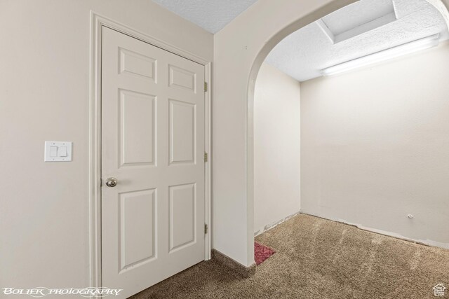 1688 N 175 W, Cedar City, UT 84721 - corridor featuring carpet flooring, a textured ceiling, and arched walkways