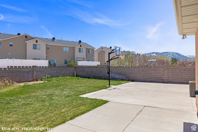 1688 N 175 W, Cedar City, UT 84721 - view of yard with a residential view, basketball hoop, cooling unit, and a mountain view