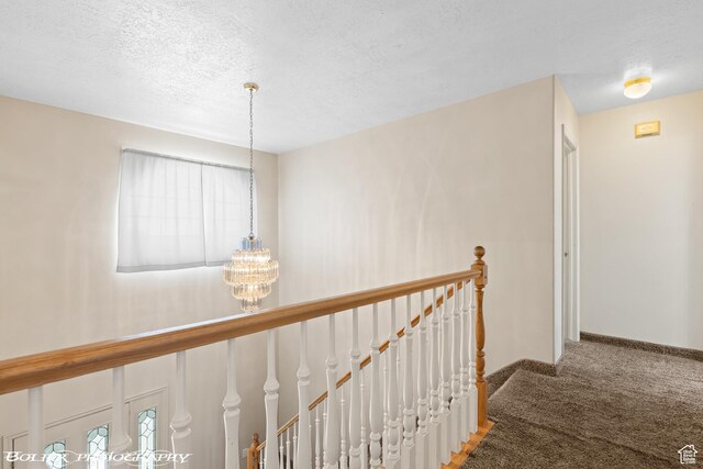 1688 N 175 W, Cedar City, UT 84721 - stairs featuring carpet floors, a chandelier, a textured ceiling, and baseboards
