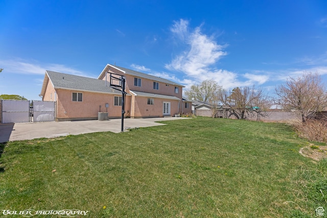 1688 N 175 W, Cedar City, UT 84721 - back of house with a gate, stucco siding, and a patio area