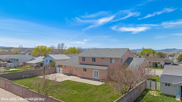 1688 N 175 W, Cedar City, UT 84721 - view of front of home with a residential view, a patio area, stucco siding, a shingled roof, and a mountain view