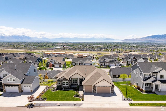aerial perspective of suburban area with mountains