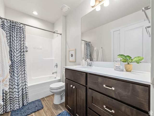 98 E 1040 N Unit 134, Santaquin, UT 84655 - bathroom featuring wood finished floors, vanity, toilet, and shower / bath combo