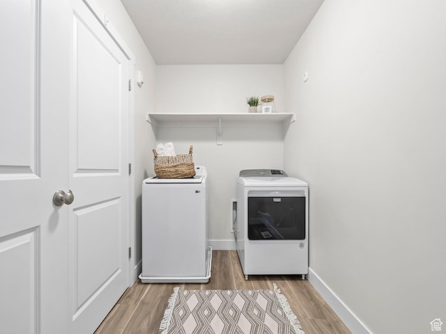 98 E 1040 N Unit 134, Santaquin, UT 84655 - laundry area with independent washer and dryer, light wood-style floors, and baseboards