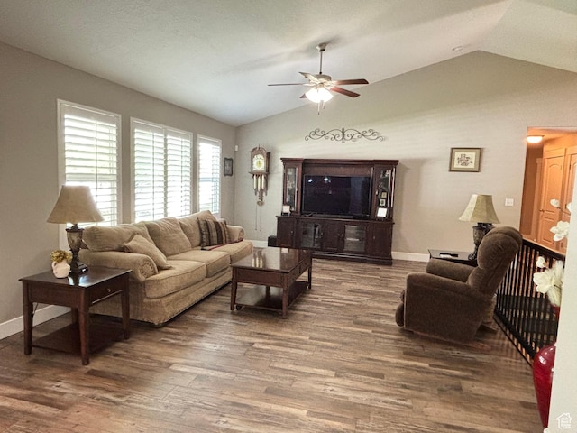 1522 S 1100 E, Spanish Fork, UT 84660 - living area with vaulted ceiling, ceiling fan, wood finished floors, and baseboards