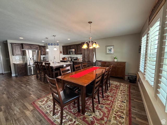 1522 S 1100 E, Spanish Fork, UT 84660 - dining space featuring a chandelier, dark wood-style flooring, and recessed lighting