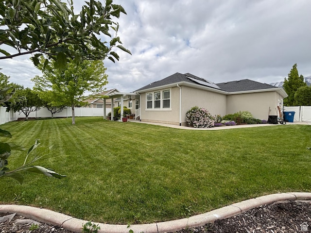 1522 S 1100 E, Spanish Fork, UT 84660 - view of side of home with solar panels and stucco siding