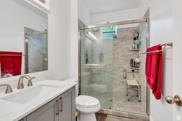274 N Foxboro Dr, North Salt Lake, UT 84054 - full bath featuring a stall shower, vanity, toilet, and wood finished floors