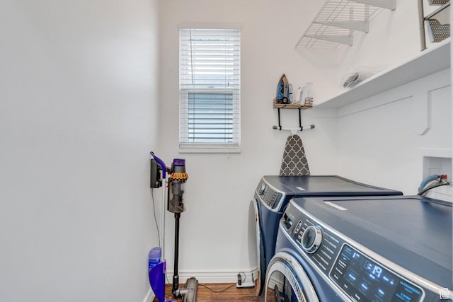 274 N Foxboro Dr, North Salt Lake, UT 84054 - clothes washing area with washing machine and dryer, baseboards, and wood finished floors