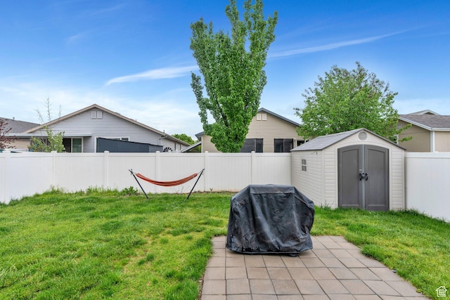 274 N Foxboro Dr, North Salt Lake, UT 84054 - view of yard with a storage unit, an outdoor structure, and a patio area