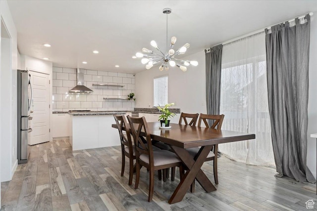 15134 S White Hart Ln, Bluffdale, UT 84065 - dining room featuring a chandelier, light wood finished floors, and recessed lighting