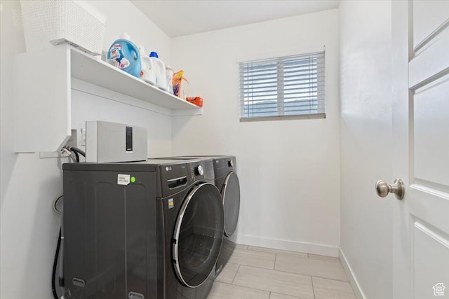 15134 S White Hart Ln, Bluffdale, UT 84065 - laundry room featuring washing machine and clothes dryer and baseboards