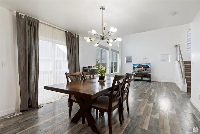 15134 S White Hart Ln, Bluffdale, UT 84065 - dining room featuring a chandelier, wood finished floors, and stairs