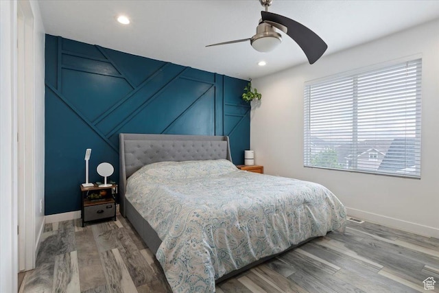 15134 S White Hart Ln, Bluffdale, UT 84065 - bedroom with wood finished floors, ceiling fan, and recessed lighting