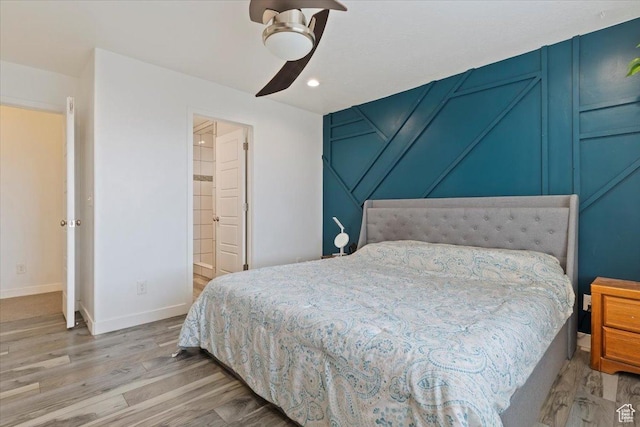 15134 S White Hart Ln, Bluffdale, UT 84065 - bedroom featuring light wood-type flooring, a ceiling fan, recessed lighting, and a decorative wall