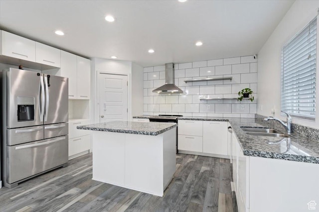 15134 S White Hart Ln, Bluffdale, UT 84065 - kitchen with appliances with stainless steel finishes, wall chimney range hood, open shelves, light wood finished floors, and recessed lighting